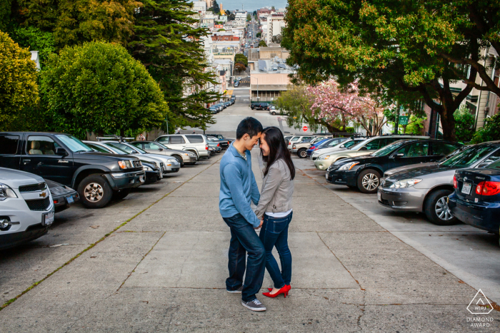 A San Francisco couple at the top of a steep street in the city