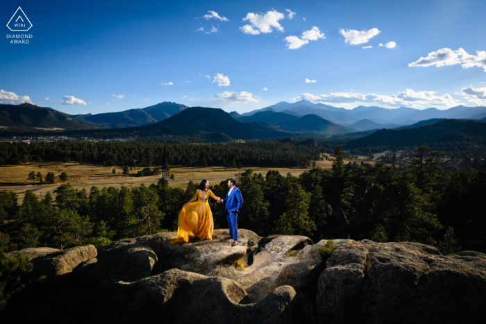 The couple's engagement portrait encapsulates their love, grace and joy against the majestic Rocky Mountain National Park backdrop