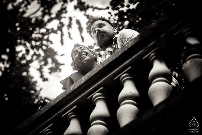 A serene and happy low-angle engagement photo shoot in Parc Alfred Wallach, Alsace, France