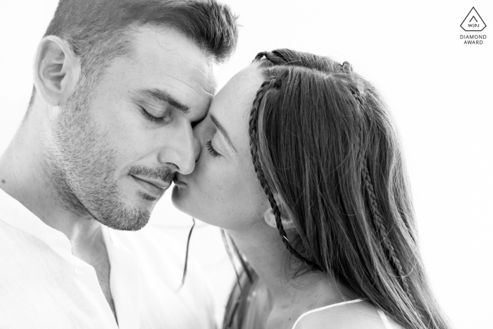 At their private home in Ravenna, Italy, the couple shared a sweet kiss with their eyes closed, capturing the pure love they have for each other against a simple white backdrop.
