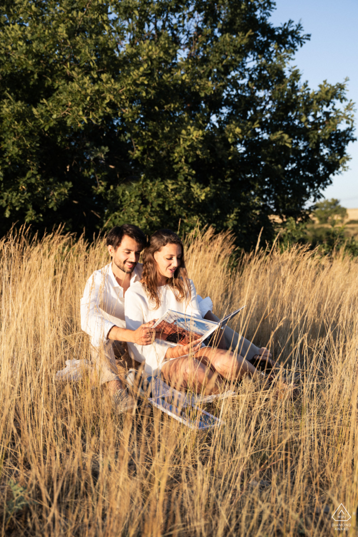 This lovely portrait in Sault, Provence, France, captures the engaged couple remembering their travel memories during their session, symbolizing the shared history and adventures that brought them together.