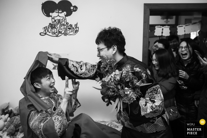 Photo by: <a href="https://www.wpja.com/contests/2018-v01-photography-competition/best-wedding-photographers/2166251">Xiaoshui Zhao - Yuxi Yunnan</a> China bridal party having fun at the brides house before the wedding