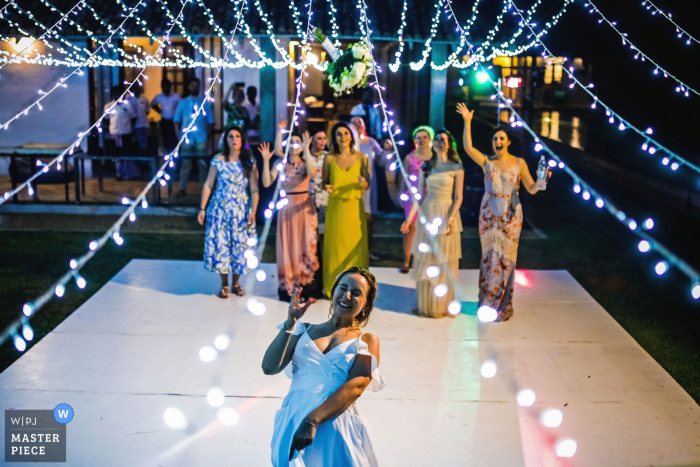Photo by: <a href="https://www.wpja.com/contests/2018-v01-photography-competition/best-wedding-photographers/2169376">Geeshan Bandara - Rajagiriya Western</a> Guests getting ready to catch the bouquet at the reception at Frangipani Tree, Unawatuna, Sri Lanka