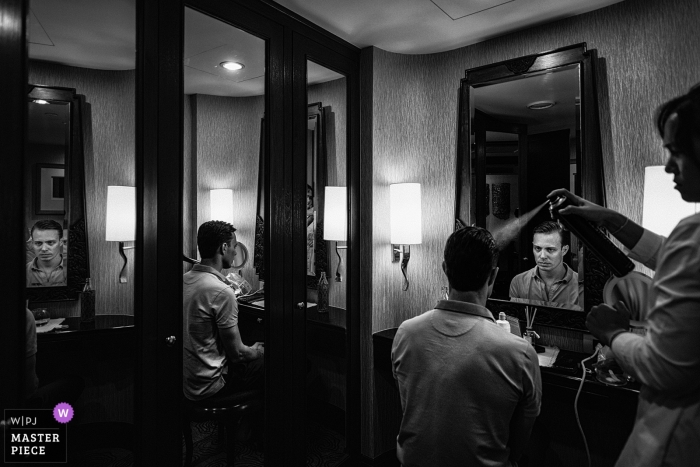 Photo by: <a href="https://www.wpja.com/contests/2018-v01-photography-competition/best-wedding-photographers/2172021">Chanarthip Cheingthong - Bangkok </a> Bangkok, Thailand groom getting his hair ready for the wedding ceremony