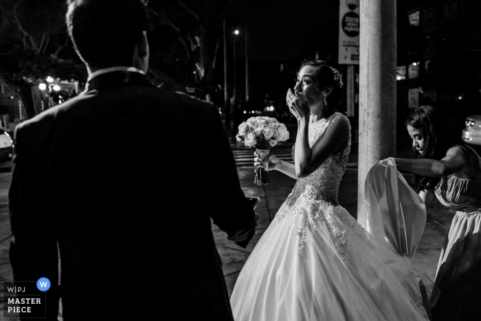 Photo by: <a href="https://www.wpja.com/contests/2018-v01-photography-competition/best-wedding-photographers/2172561">Omar Berr - Lima</a> Lima, Peru bride gets emotional next to the groom at the wedding