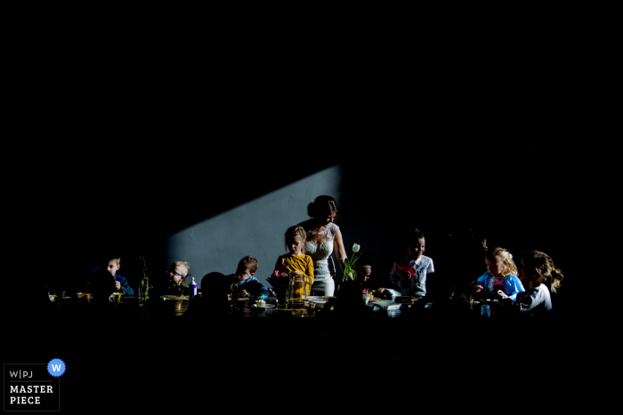 Photo by: <a href="https://www.wpja.com/contests/2018-v01-photography-competition/best-wedding-photographers/2172736">Gerhard Nel - The Hague Zuid Holland</a> Netherlands bride with lots of kids at the reception