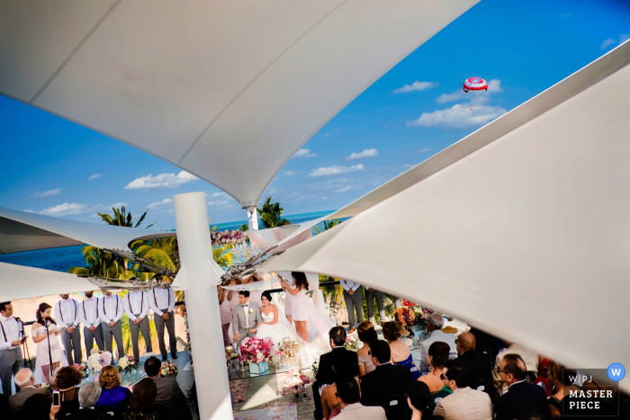 Photo by: <a href="https://www.wpja.com/contests/2018-v04-photography-competition/best-wedding-photographers/2191041">Ben Chrisman - Charleston South Carolina</a> Mexico view of the wedding ceremony outside during the day