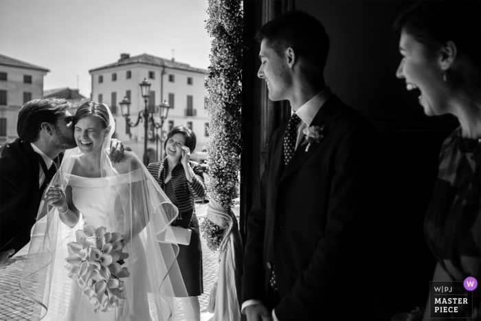 Photo by: <a href="https://www.wpja.com/contests/2018-v06-photography-competition/best-wedding-photographers/2209696">Daniele Borghello - Padova</a> Brides father kisses her on the cheek at the wedding in Veneto, Italy