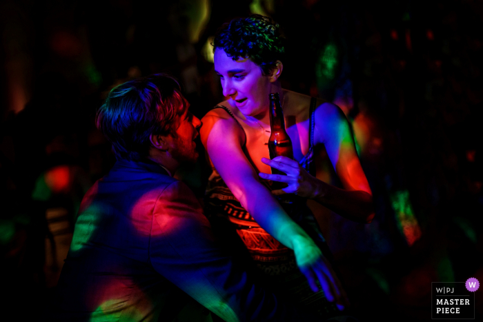 Photo by: <a href="https://www.wpja.com/contests/2018-v06-photography-competition/best-wedding-photographers/2212581">Shaun Baker - San Diego California</a> Reception dance party revelers enjoy the colorful spotted lights at this Temecula, California wedding