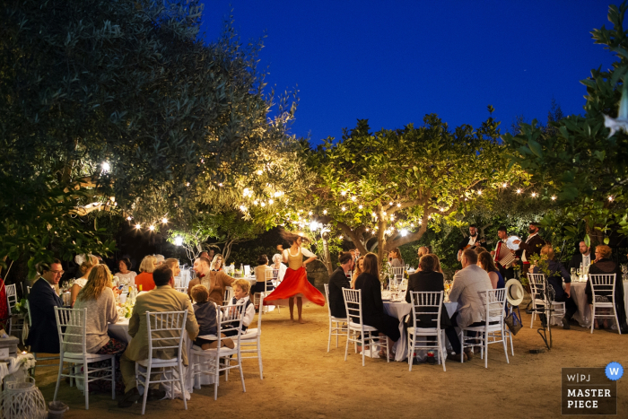 Photo by: <a href="https://www.wpja.com/contests/2018-v06-photography-competition/best-wedding-photographers/2213716">Nino Lombardo - Taormina Trapani</a> Outside photo of guests at the wedding reception Santa Flavia, Palermo, Sicily
