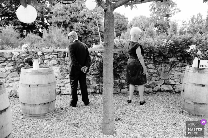 Photo by: <a href="https://www.wpja.com/contests/2018-v07-photography-competition/best-wedding-photographers/2228646">David Page - Puysserampion </a> France guests outside at the wedding