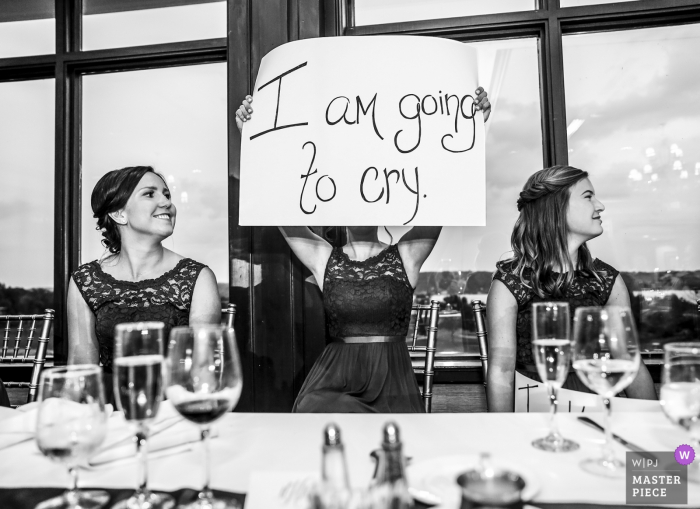 Bridesmaids assist with signage during the Maid of Honors' speech Geneva National Wedding Lake Geneva WI | Bridesmaids assist with signage during the Maid of Honors' speech.