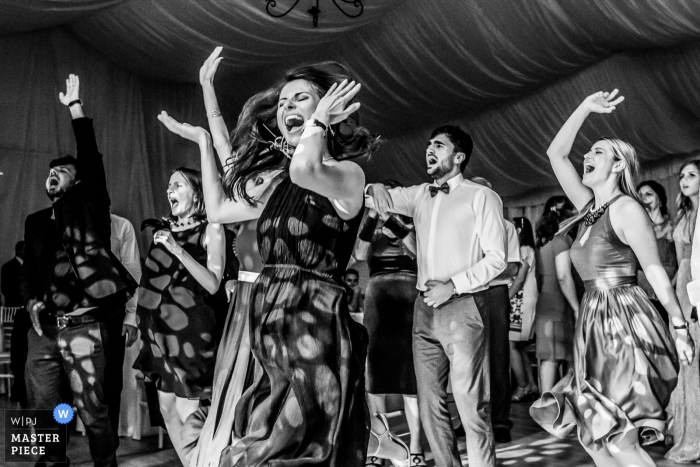 Photo by: <a href="https://www.wpja.com/contests/2018-v13/best-wedding-photographers/2288871">Mihai Zaharia - Bucharest București</a> Bucharest Wedding Photojournalist | let the dance party begin at this Romania wedding reception