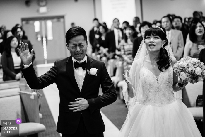 Photo by: <a href="https://www.wpja.com/contests/2018-v15/best-wedding-photographers/2307771">Wenjie Han - Long Island City New York</a> A New York City church ceremony turns tearful and emotional for this groom