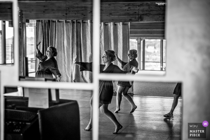 Photo by: <a href="https://www.wpja.com/contests/2018-v15/best-wedding-photographers/2313756">Earl McCoy - Columbia Heights Minnesota</a> Wedding picture by Minneapolis photographer - practicing dance reflection before the Minnesota reception