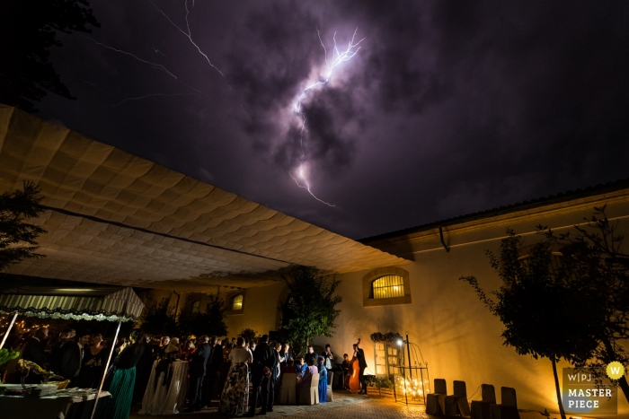 Photo by: <a href="https://www.wpja.com/contests/2018-v15/best-wedding-photographers/2317156">Miguel Onieva - Madrid Madrid</a> Cadiz, Andalucía (Spain) wedding reception with lightning overhead