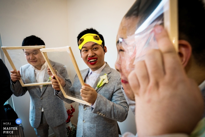 Foto por: <a href="https://www.wpja.com/contests/2018-v18/best-wedding-photographers/2354331"> Vinci Wang - FuZhou </a> Fujian foto de la boda | Fotografía de boda de padrinos de boda jugando a los juegos tradicionales