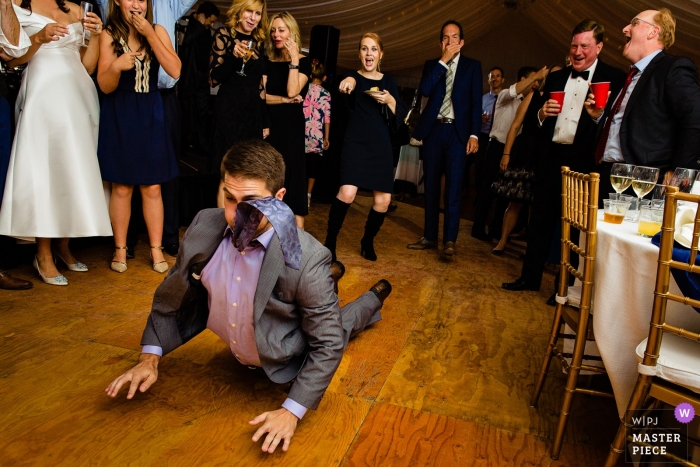 Photo by: <a href="https://www.wpja.com/contests/2018-v18/best-wedding-photographers/2359826">Kate Crabtree - Bangor Maine</a> Wedding shoot with Blue Hill reception guest doing the worm while dancing