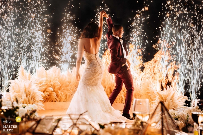 Photo by: <a href="https://www.wpja.com/contests/2018-v18/best-wedding-photographers/2360301">Stam Chananakhon - Phuket </a> Pictures of a couple dancing it before a shower of fireworks by a top Phuket wedding photographer