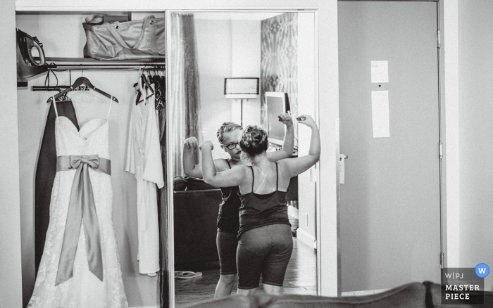Photo by: <a href="https://www.wpja.com/contests/2018-v19/best-wedding-photographers/2377746">Andrea Bibeault - Omaha Nebraska</a> Omaha Wedding Photography of kids getting ready for the wedding in a mirror