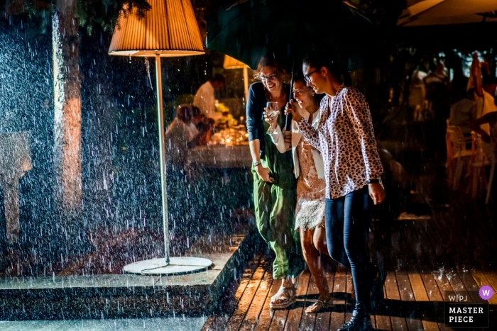 Photo by: <a href="https://www.wpja.com/contests/2018-v19/best-wedding-photographers/2378116">Boni Bonev - Sofia Sofia</a> Bulgaria wedding rain | The end of the party