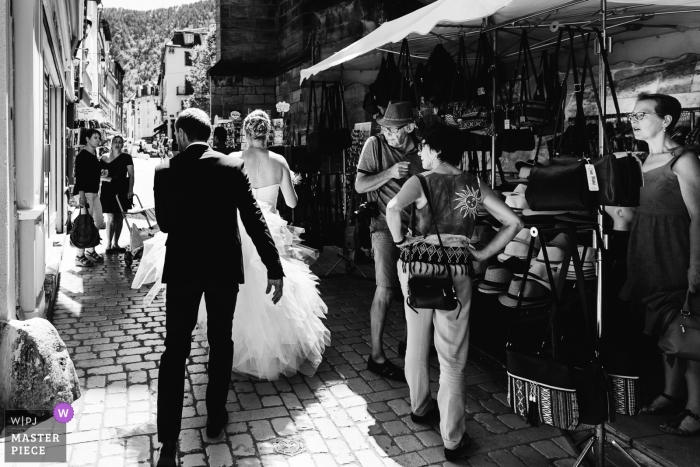 Photo by: <a href="https://www.wpja.com/contests/2018-v19/best-wedding-photographers/2378386">Sylvain Garderes - Beost </a> bride and groom walking in the street after wedding in France
