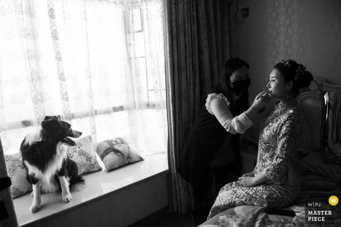 Photo by: <a href="https://www.wpja.com/contests/2018-v19/best-wedding-photographers/2380636">Edwind Poon - Shenzhen </a> Guangdong wedding photo of bride getting make up | wedding photography in China