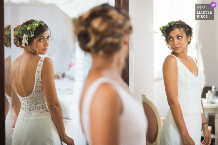 Photo by: <a href="https://www.wpja.com/contests/2018-v20-photography-competition/best-wedding-photographers/2387866">Franck Petit - Serignac sur Garonne </a> Lavardac, France wedding photography of bride getting ready in multiple mirrors