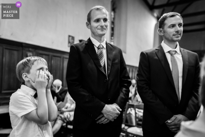 Photo by: <a href="https://www.wpja.com/contests/2018-v20/best-wedding-photographers/2390281">Hong-Phuc Bui - Trégueux </a> Bretagne boy looking tired during the wedding ceremony