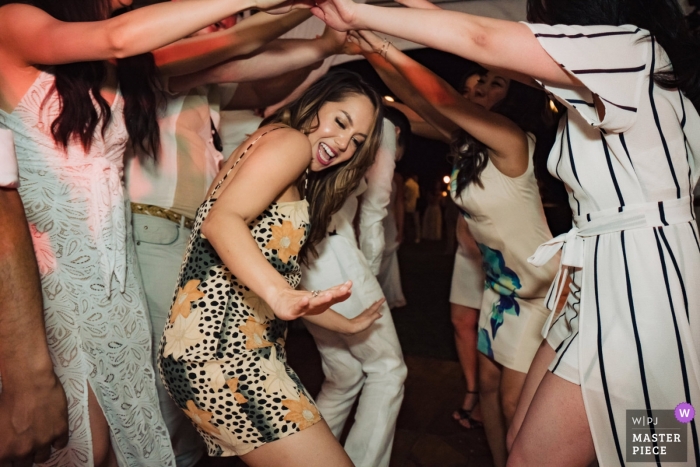 Photo by: <a href="https://www.wpja.com/contests/2019-v01/best-wedding-photographers/2434721">Nicole Chan - Quincy Massachusetts</a> Olowalu Plantation House reception dancing in Maui, Hawaii - Destination wedding photographer