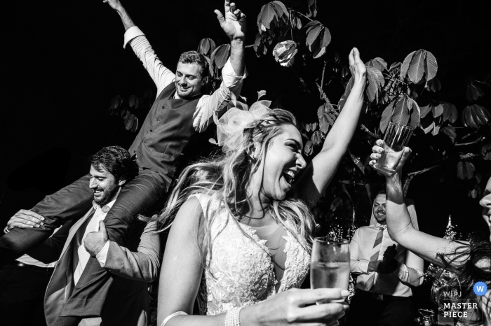 Photo by: <a href="https://www.wpja.com/contests/2019-v01/best-wedding-photographers/2436376">Vinicius Fadul - Campinas São Paulo</a> Fazenda das Cabral - fun at wedding reception, filled with dancing laughter and drinks