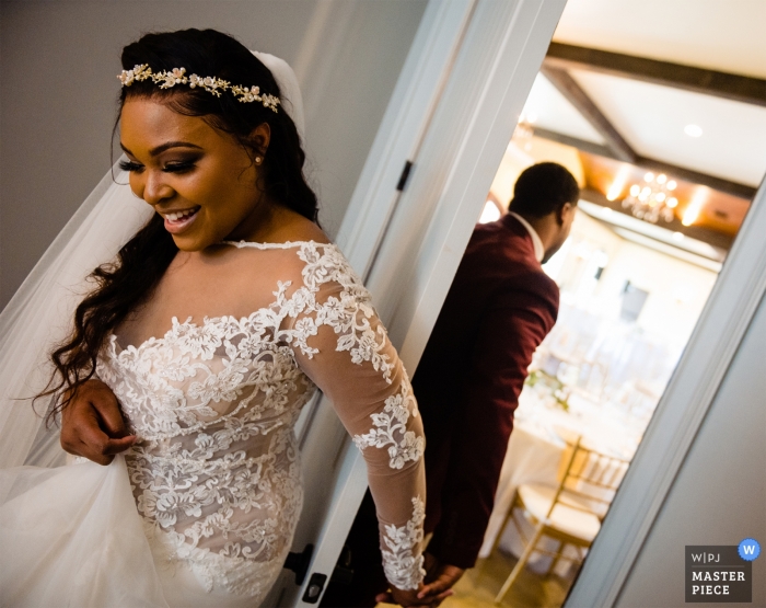 Photo by: <a href="https://www.wpja.com/contests/2019-v01/best-wedding-photographers/2438426">James Nix - Charlotte North Carolina</a> The bride and groom take a moment for a first touch prior to exchanging their vows at Tuscan Ridge in Oakboro, North Carolina.