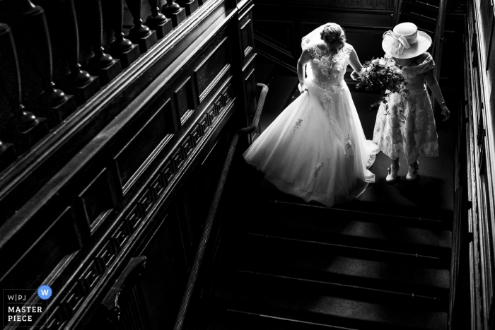 Photo by: <a href="https://www.wpja.com/contests/2019-v02/best-wedding-photographers/2446186">Andy Griffiths - St. Helens Lancashire</a> Eaves hall wedding reportage photographer | Stair way to marriage for the bride