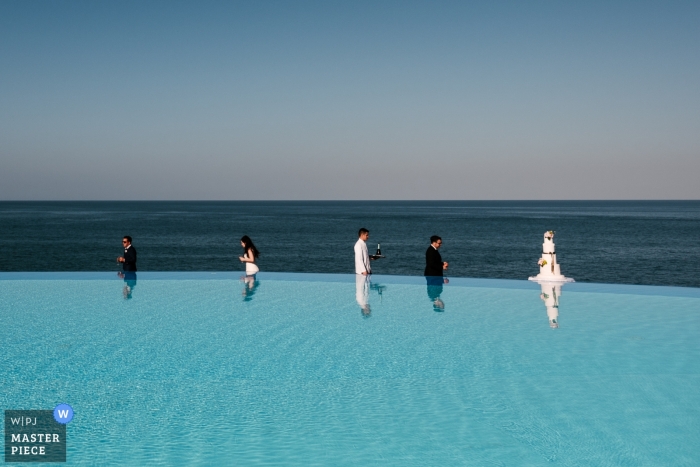 wedding photography using Reflex for pool reception photos Villa Infinito Mare wedding photographer | Reflex pool reception photos