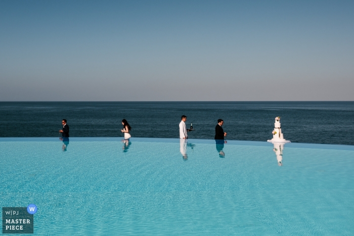 Fotografo di matrimoni Villa Infinito Mare | Foto di ricezione della piscina Reflex