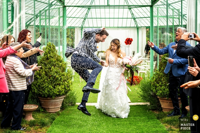 Photo by: <a href="https://www.wpja.com/contests/2019-v04/best-wedding-photographers/2465881">Alessandro Colle - Massa Massa-Carrara</a> villa di bagno - mantov wedding photo of ceremony and rice tossing