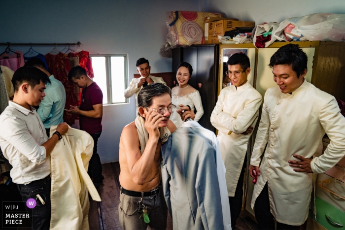 Photo by: <a href="https://www.wpja.com/contests/2019-v04/best-wedding-photographers/2470201">Vu Nguyen - Ho Chi Minh </a> Photo of the bridal party and groom getting ready for the ceremony at the Groom House in Saigon by a Vietnam wedding photographer.