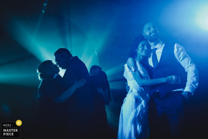 Photo by: <a href="https://www.wpja.com/contests/2019-v04/best-wedding-photographers/2471276">Daniel Monteiro - Porto </a> Amares - Pousada Santa Maria do Bouro wedding reception photograph in blue lights and DJ fog effects
