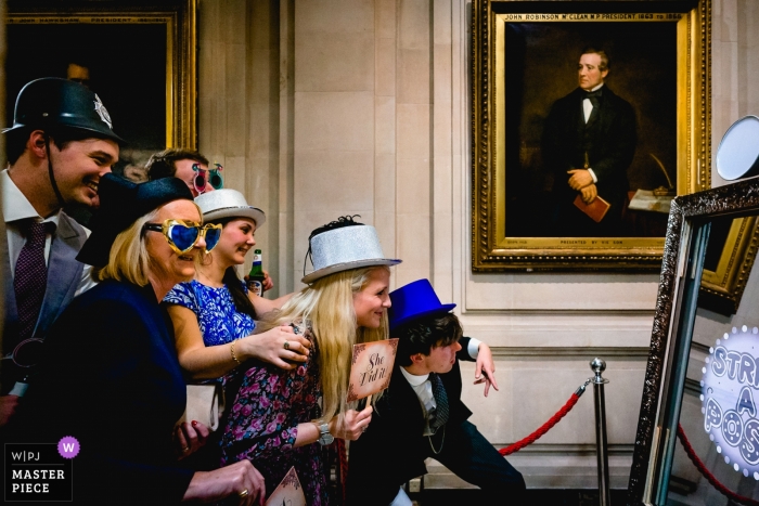 One Great George Street, London wedding photography showing the Guests at a Photo Booth