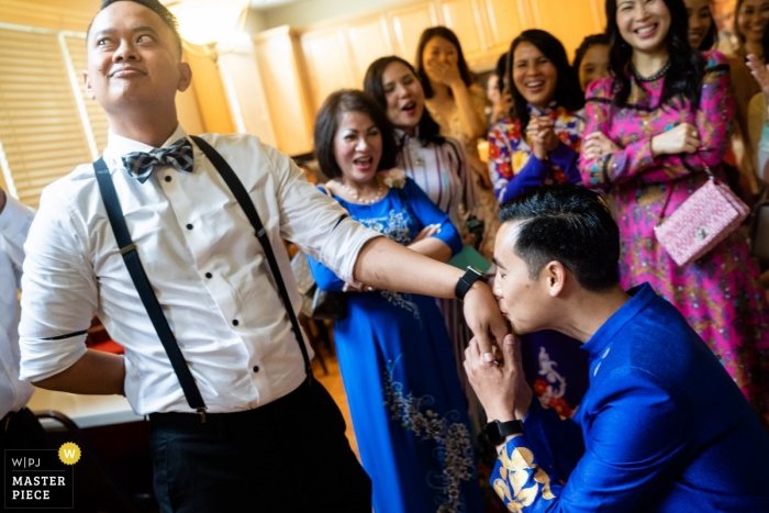 Photo by: <a href="https://www.wpja.com/contests/2019-v04/best-wedding-photographers/2471666">Joshua Grasso - Buford Georgia</a> Atlanta Georgia wedding photograph of the groom kissing the groomsmen