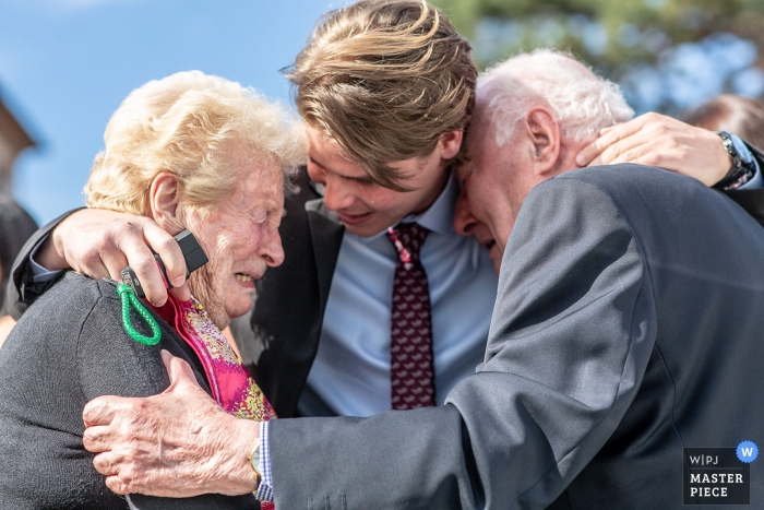 Photo by: <a href="https://www.wpja.com/contests/2019-v05/best-wedding-photographers/2473526">Nicolas Bernard - Ammerschwihr </a> Haut-Rhin wedding photographer captured this photo of two grandparents crying tears of joy as they hand off their grandson to be wed at a ceremony at Ingersheim
