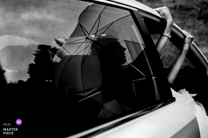 Photo by: <a href="https://www.wpja.com/contests/2019-v05/best-wedding-photographers/2473876">Raymond Nguyen - Sacramento California</a> iris florist farms- placerville wedding photo taken while the bride tried to get out of car