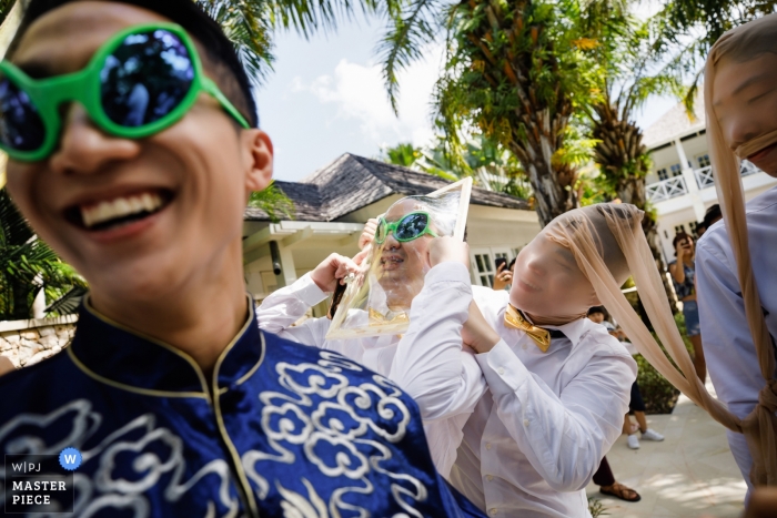 Photo by: <a href="https://www.wpja.com/contests/2019-v05/best-wedding-photographers/2477806">Mango Gu - Hangzhou </a> Bali Indonesia Wedding Photo of The Groom in the Game Outside with Groomsmen