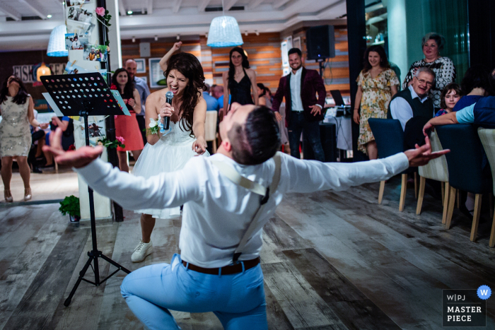 Photo by: <a href="https://www.wpja.com/contests/2019-v05/best-wedding-photographers/2478696">Bozhidar Krastev - Ruse </a> Hotel and Bar Tyulenovo, Bulgaria - Wedding Reception Photo During The Bridal Song