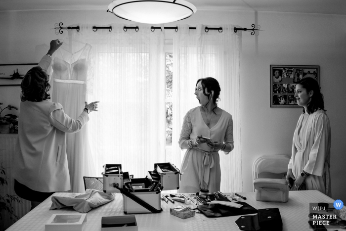Photo by: <a href="https://www.wpja.com/contests/2019-v05/best-wedding-photographers/2479006">Sybil Rondeau - Nantes </a> Mairie de Basse Goulaine Wedding Prep Photos - Surprise when the dress appears.