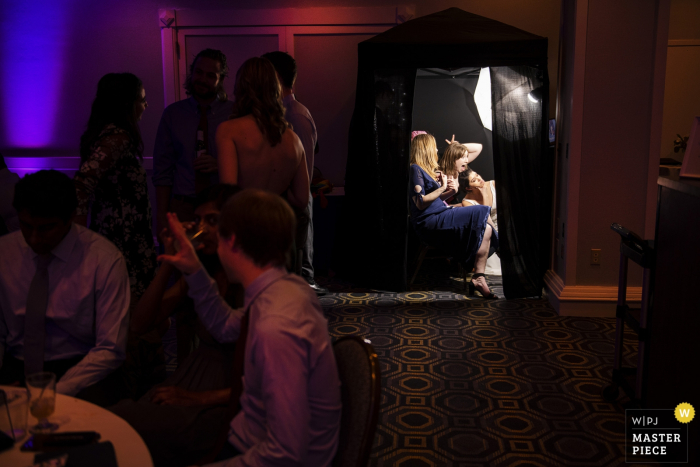 Photo by: <a href="https://www.wpja.com/contests/2019-v05/best-wedding-photographers/2480231">Simi Rabinowitz - Somerville Massachusetts</a> Marriott - Cambridge, MA Wedding Photos - Having fun in the photobooth during reception