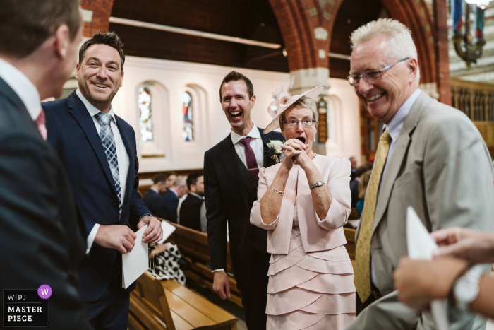 Photo by: <a href="https://www.wpja.com/contests/2019-v05/best-wedding-photographers/2480441">Karen Flower - Thames Ditton Surrey</a> England Wedding Photography at St Andrew's Church of the guest arrival