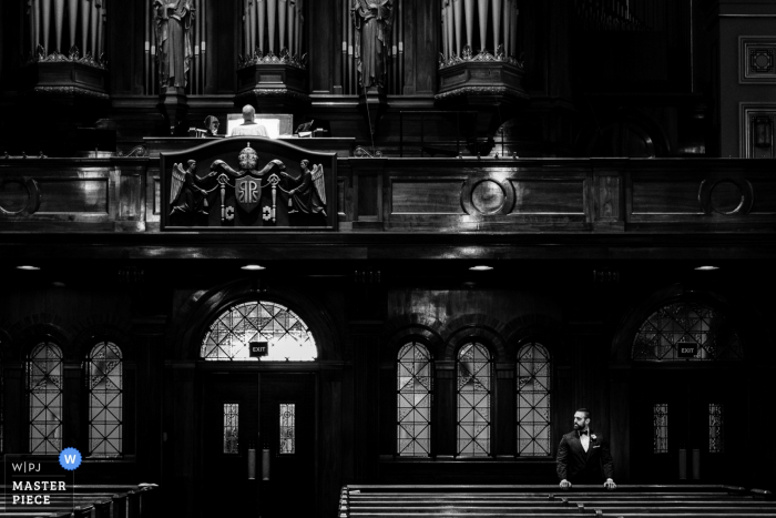 Photo by: <a href="https://www.wpja.com/contests/2019-v05/best-wedding-photographers/2482511">JD Land - Marlton New Jersey</a> Cathedral Basilica of Saints Peter and Paul | Wedding Photo of the Groom anxiously awaiting the start of the ceremony.
