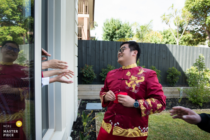 Photo by: <a href="https://www.wpja.com/contests/2019-v05/best-wedding-photographers/2483996">Jiake Yang - Melbourne Victoria</a> Victoria Door games before the wedding ceremony. Australia Wedding Photography.
