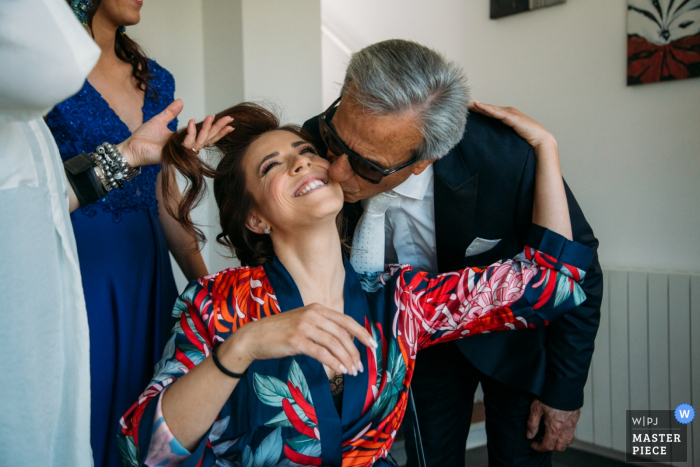 Wedding Photography showing a Kiss between dad and bride Castello Pupillo Wedding Photography showing a Kiss between dad and bride